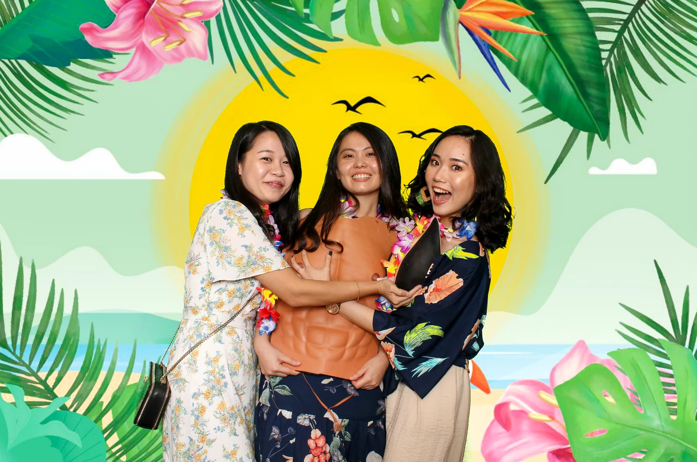 Guests posing in a Whoots green screen photo booth example